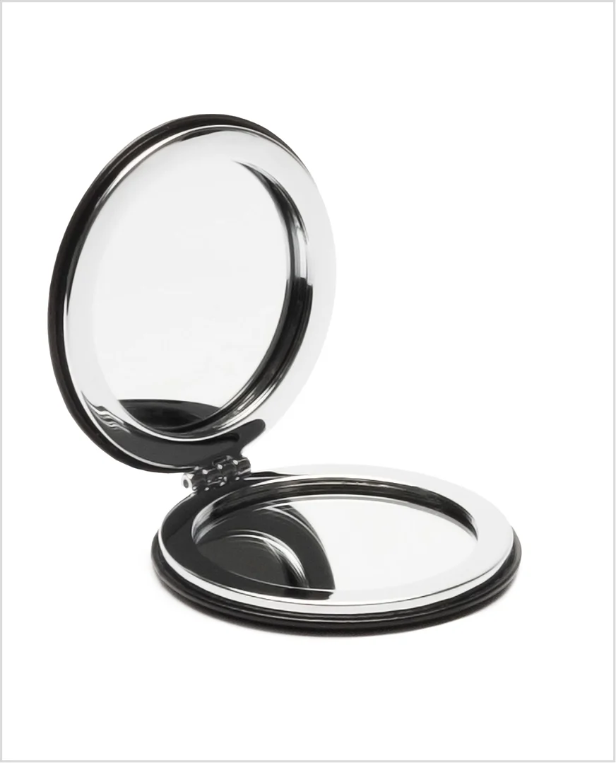 Compact mirror kept openned